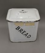 A vintage enamel bread bin. 35 cm high.