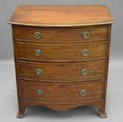 A small late 19th/early 20th century mahogany bowfront chest of drawers. 75 cm wide.