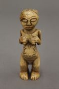 A possibly 19th century, Congo Region Luba tribe carved ivory fertility figure.