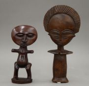 Two African Ashanti fertility dolls. The largest 27 cm high.