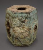 A Chinese Ming Dynasty miniature pottery barrel seat. 20.5 cm high.