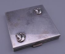 A Georg Jensen silver compact. 7 cm wide.