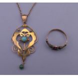 An Art Nouveau 9 ct gold pendant and a 9 ct gold ring. Ring size J. 5.3 grammes total weight.
