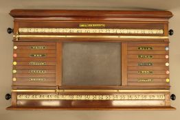 An Orme and Sons mahogany snooker billiard score board and life pool board. 95 cm wide.