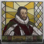 Three modern stained glass panels, depicting King James I, King Charles I and King Charles II.