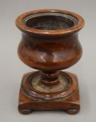 A 19th century turned treen footed bowl. 20.5 cm high.