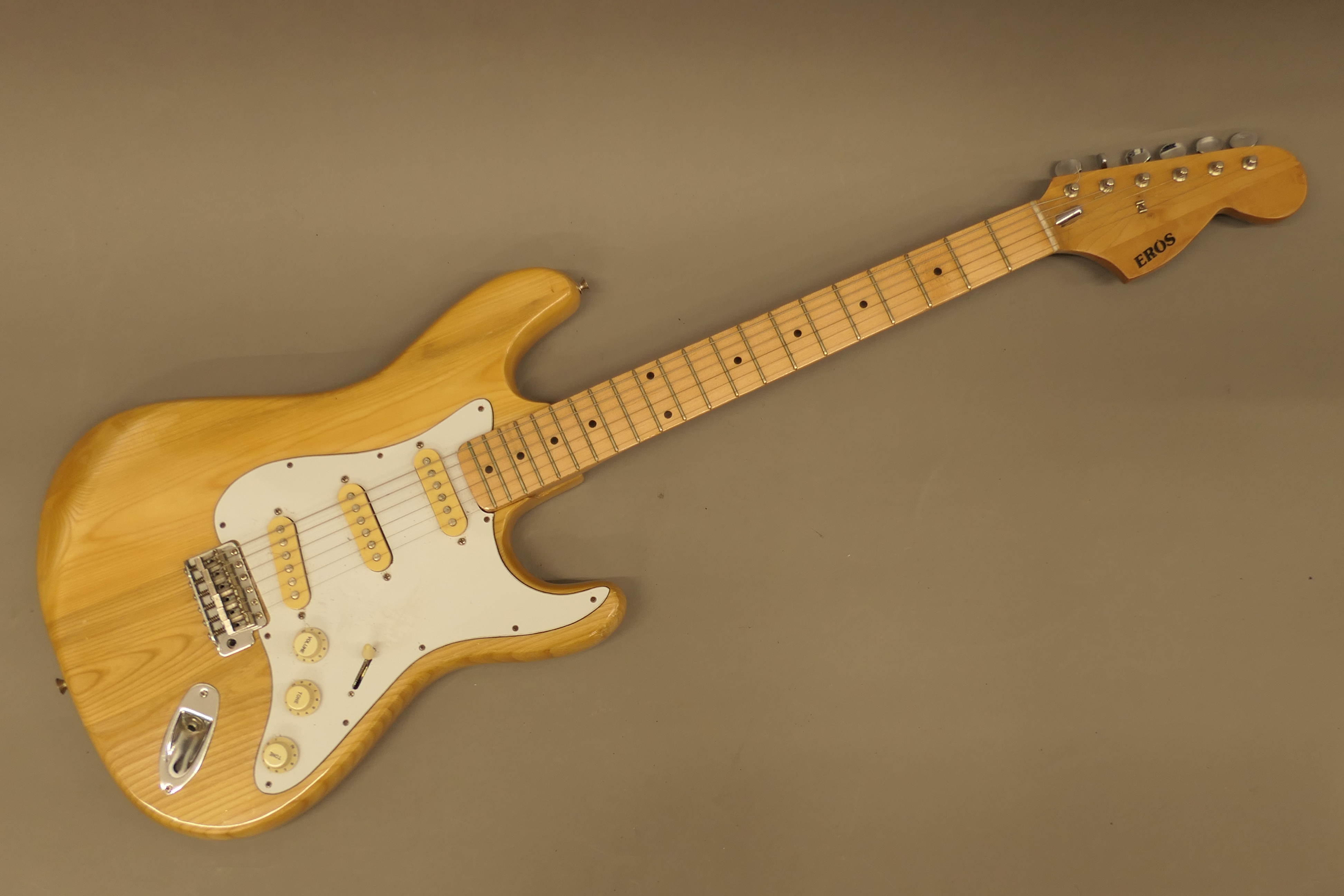 A 1970's Eros Stratocaster electric guitar, in working order. 102 cm long.