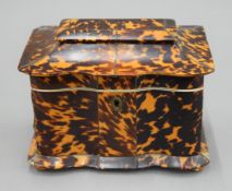 A 19th century tortoiseshell tea caddy. 16.5 cm wide.