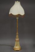 A decorative beaded table lamp. 85 cm high.