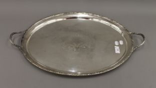 An oval twin handled EPNS tray. 65 cm wide.