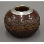 A silver mounted stoneware match striker. 4.5 cm high.