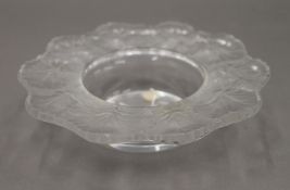 A Lalique glass dish, signed Lalique (R) France. 14.5 cm diameter.