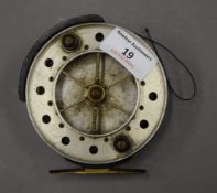 A 1939 Ariel Match centre pin fishing reel by S Allcock. 11 cm high.