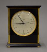 A Hermes mantle clock. 18 cm high.
