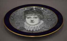 An Ashworths porcelain platter decorated with the portrait of a lady. 43 cm diameter.