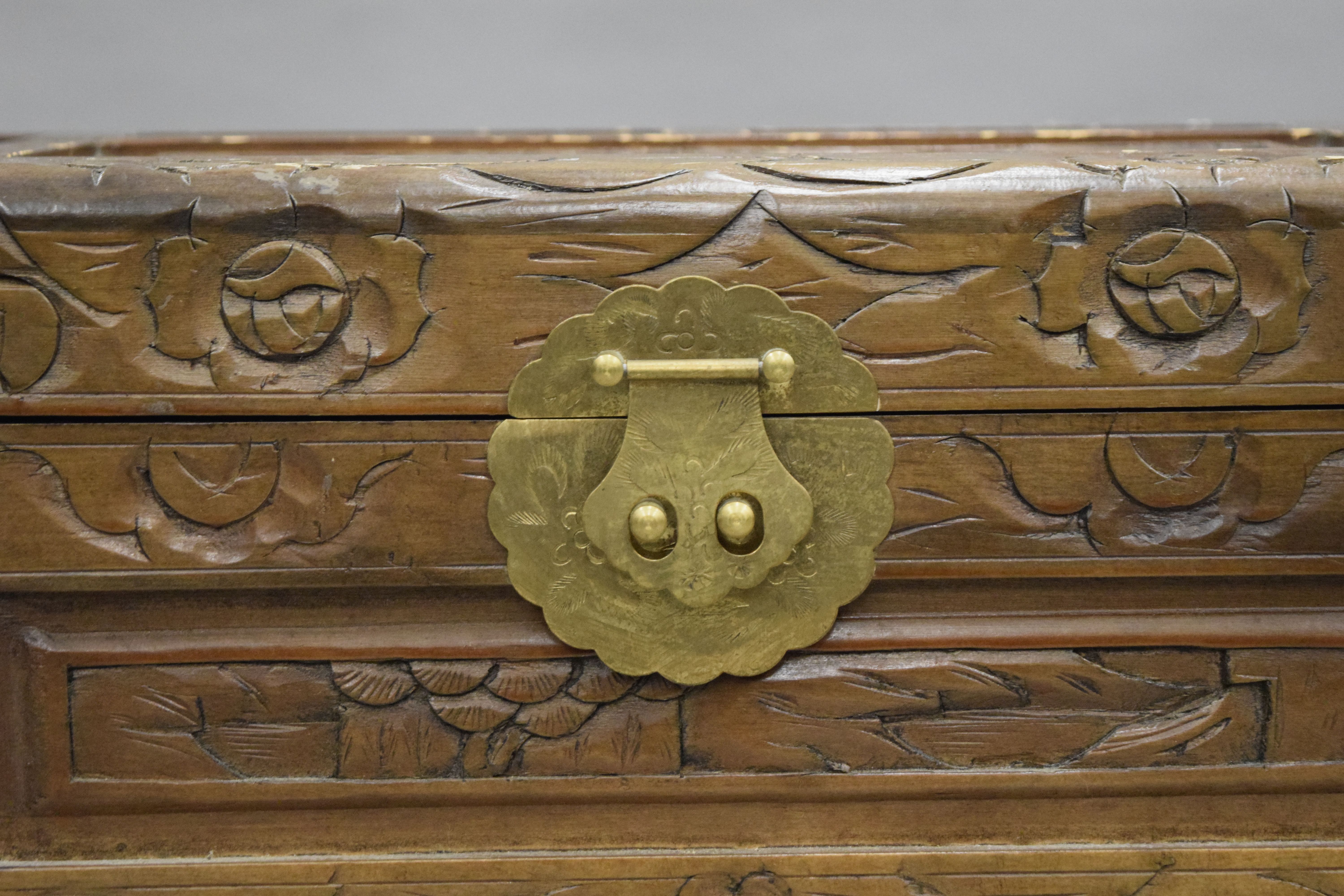 An Eastern carved camphor wood trunk. 68.5 cm wide. - Image 3 of 7