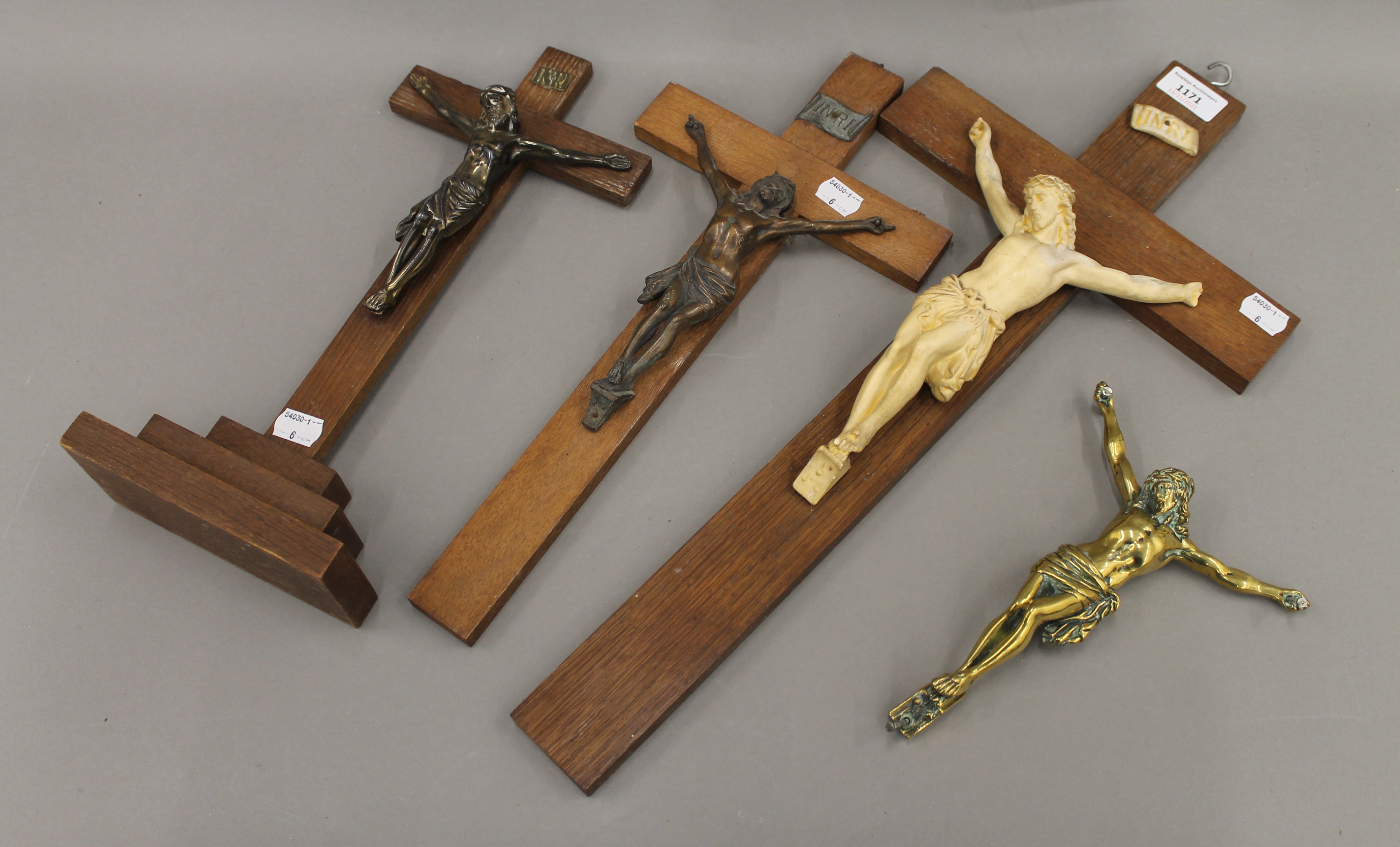A collection of various crucifixes. The largest 54 cm high.