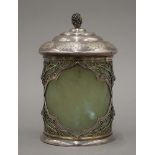 A silver mounted cylindrical jade lidded box. 12.5 cm high.