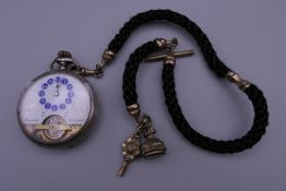 An 800 silver pocket watch, a Victorian hair twist Albert watch chain and fob.