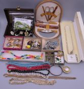 A quantity of costume jewellery and a manicure set, etc.