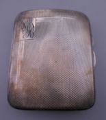 A silver cigarette case. 7 cm wide. 66.6 grammes total weight.