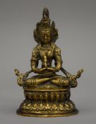 A small antique Tibetan brass seated Buddha. 12.5 cm high.