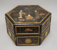 A Chinese hexagonal hardstone mounted and lacquered box. 32 cm wide.
