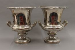 A pair of old Sheffield plate wine coolers. 27 cm high.