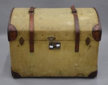 A Victorian leather mounted travelling trunk. 69 cm long.