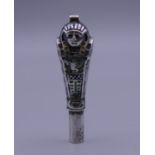 An Egyptian Revival silver and enamel pendant form pencil (lacking lead). 4 cm high.