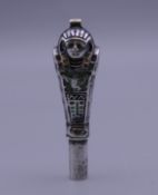 An Egyptian Revival silver and enamel pendant form pencil (lacking lead). 4 cm high.