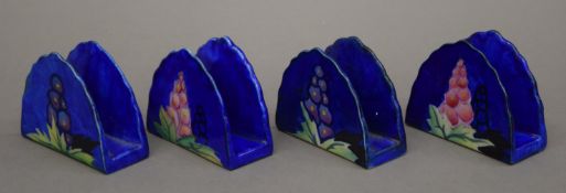 A boxed set of four Carltonware delphinium pattern napkin rings.