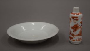 A 19th century Chinese porcelain iron red decorated cylindrical snuff bottle and a small 18th