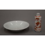 A 19th century Chinese porcelain iron red decorated cylindrical snuff bottle and a small 18th