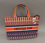 A Christian Dior shopping bag. 40 cm wide.