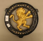 A cast iron Clark Hunt & Co Ltd Shoreditch Ironmonger Foundry gate crest. 23.5 cm diameter.