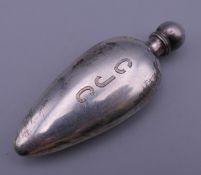 A small unmarked silver scent bottle. 6 cm high.