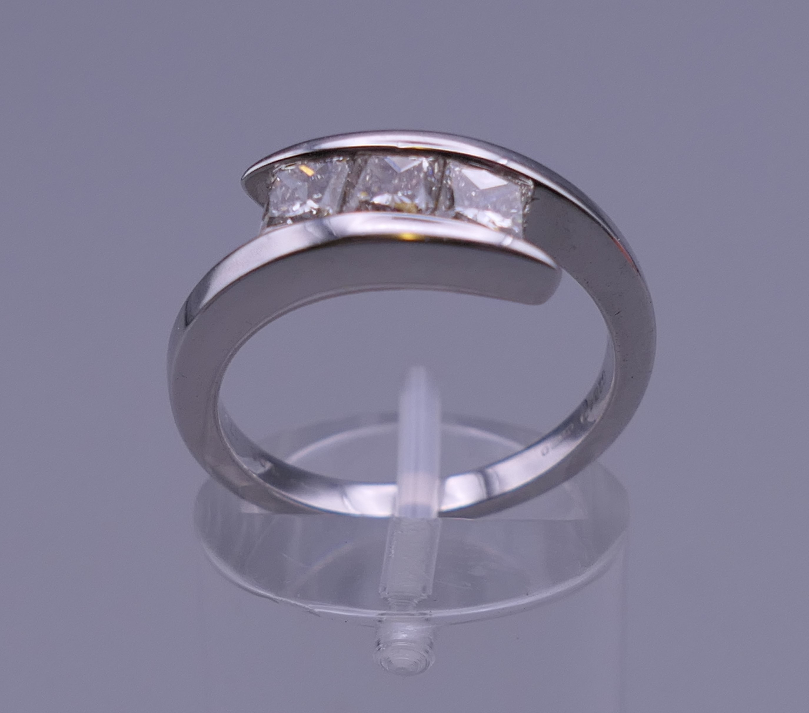 An 18 ct white gold square cut diamond three stone ring. Approximately 1.06 carats of diamond. - Image 2 of 7