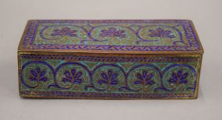 A 19th century Indian gilded copper and blue enamel box,