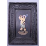 A 19th century pietra dura panel formed as a drinking figure, housed in a carved frame. 17 x 25.