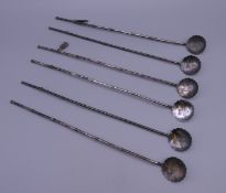 Six Chinese silver spoons. Each 22.5 cm long.