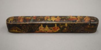 A 19th century Qajar papier mache scribes box. 22 cm long.