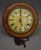 A Victorian mahogany framed dial clock. 31 cm diameter.