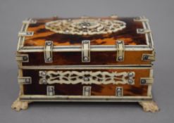 A small early 20th century Vizagapatam tortoiseshell and ivory box. 10 cm wide.