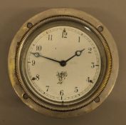 A vintage Smith's car clock, in working order. 10.5 cm diameter.