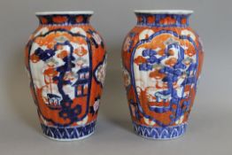 A pair of Japanese Imari vases. 25 cm high.