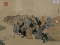 A Chinese watercolour of a Village Scene, framed and glazed. 42 x 31.5 cm.