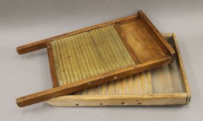 Two vintage washboards. The largest 60 cm high.