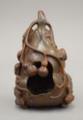 A Chinese carved bamboo brush washer formed as a gourd. 14 cm high.