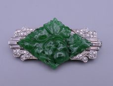 A Tiffany & Co jade, diamond and platinum brooch. 4.5 cm wide. 12.2 grammes total weight.